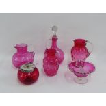 Collection of Victorian cranberry glass to include a decanter and stopper, water jugs, bowl,