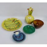 Collection of studio pottery to include a bowl, shell shaped plate, an agate style tray and