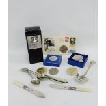 A mixed lot to include commemorative coins, Epns teaspoons, mother of pearl handled fruit knife