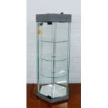 Glazed hexagonal display case with shelved and mirrored interior, 77 x 36cm