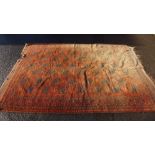 Large Bokhara carpet / rug, the red field with three rows of seven guls 336 x 220cm