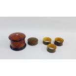 Group of late 19th century Mauchline 'Tartan Ware' to include three napkin rings, small circular box