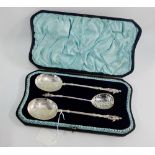 Victorian cased set of three silver spoons, with hexagonal stems and figural terminals, to include