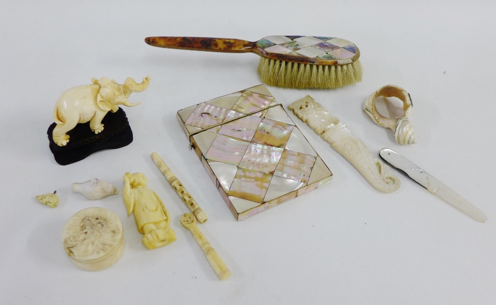 Mother of pearl card case together with a fruit knife, hairbrush, napkin ring, early 20th century