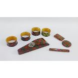 Group of late 19th century Mauchline 'Tartan Ware' to include four napkin rings, bobkin holder,