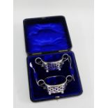 Victorian set of two silver salts with blue glass liners and spoons, in fitted case, Birmingham 1899