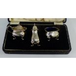 Birmingham silver condiment set comprising salt, pepper and mustard with blue glass liners, boxed (