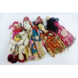 Four antique Chinese puppets, dressed in traditional costumes, 44cm long, (4)