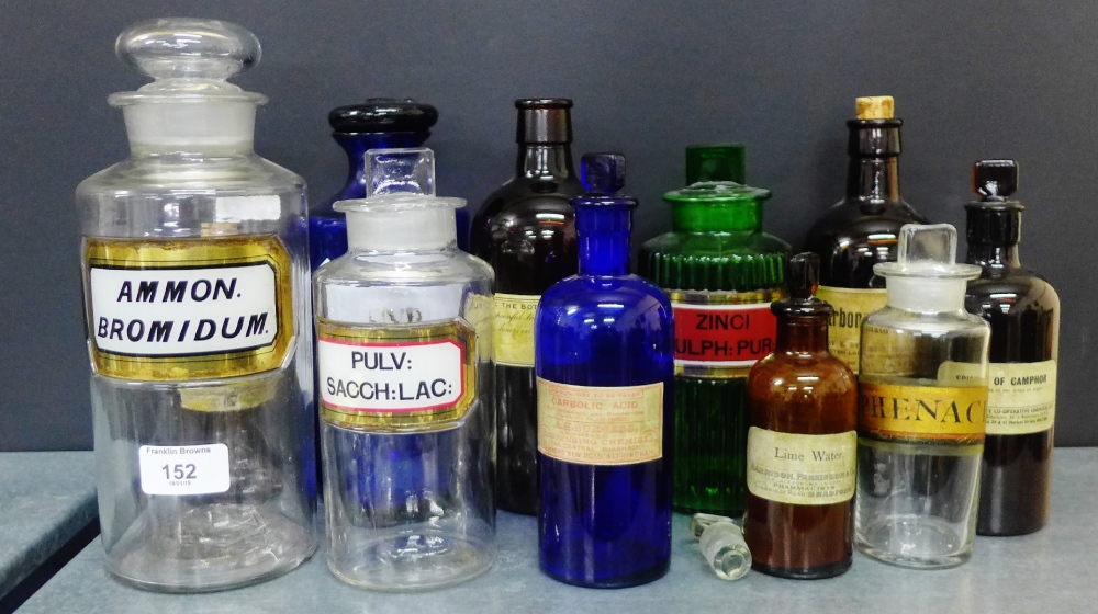 Quantity of pharmacy glass jars and stoppers, tallest 24cm high, (11)