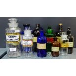 Quantity of pharmacy glass jars and stoppers, tallest 24cm high, (11)