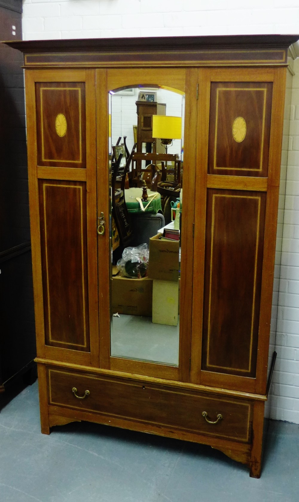 Mahogany and inlaid wardrobe with a central mirror door and long drawer to the base, 200 x 130cm