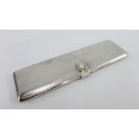 George VI silver cigarette case with engine turned decoration and gilt interior, with makers mark
