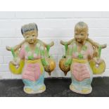 Pair of carved figures, 54 x 38cm, (2)