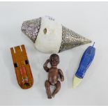 Mixed lot to include a bisque baby and two die cast cars and a white metal mounted shell, (4)
