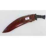 Kukri with leather scabbard and two additional short knives