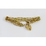 9 carat gold gatelink bracelet with heart shaped padlock