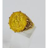 George V 1914 gold half sovereign in a 9 carat gold mount, UK ring size O