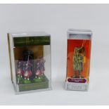 Two boxed piper figures to include the 'Black Watch', (2)