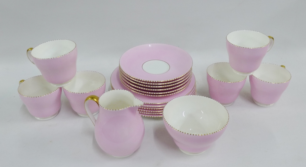 Wedgwood bone china pink glazed teaset comprising six cups, six saucers, six side plates, cream