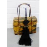 Vintage basket weave handbag, together with two hardstone pierced discs with black tassels, (3)