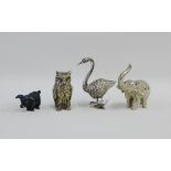 A collection of miniature white metal figures to include a swan, elephant and an owl together with a