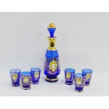 Blue glass liquor set with enamelled flowers and gilt decoration, (7)