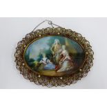 Oval portrait miniature of an 18th century family group, signed indistinctly and contained within an