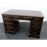 Mahogany desk, the rectangular top above two frieze drawers flanked by three short drawers, 74 x