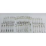 A part suite of mixed silver Fiddle Husk patterned flatware comprising five table spoons,