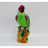 Staffordshire style pottery parrot in coloured glaze, 33cm high