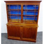 19th century mahogany bookcase cabinet, the cornice top over a pair of glazed doors, the interior