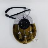 Gents seals fur sporran, with celtic knotwork to the cantle together with a black leather pouch (2)