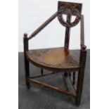 Turner's chair, with floral carved top rail, and chip carved arms and legs, 85 x 64cm