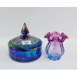 Carnival glass jar and cover, together with a small vase, (2)