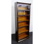 Six section Globe Wernicke style bookcase with graduating glazed lift up doors, 227 x 87cm