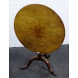 19th century mahogany tilt top table on a baluster tuned column on tripod legs