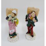 Pair of continental porcelain male and female figures, modelled standing with a fishing creel basket