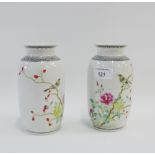 Pair of Chinese white glazed baluster vases with bird and flowering foliage pattern with calligraphy
