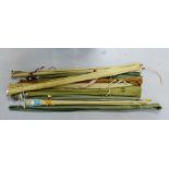 Quantity of vintage fishing rods to include Edgar Sealey etc., together with a landing net and