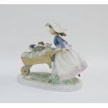Lladro porcelain figure of a Girl with Wheelbarrow and Dogs on an oval plinth base with blue printed