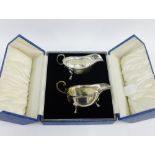 George V silver sauce boat, Birmingham 1931 together with another with Sheffield 1932 hallmarks,