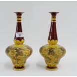 Pair of Doulton Lambeth stoneware bottle neck vases with impressed marks, 26cm high, (2)