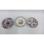 Two Chinese Imari plates, together with a French porcelain plate with Serves marks verso, (all