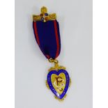 Independent Order of Oddfellows silver gilt and enamel medallion and ribbon