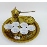 Eastern brass teapot, tray and set of six cups with blue and white ceramic liners, (a lot)