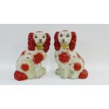 Pair of Staffordshire chimney spaniels, 32cm high, (2)