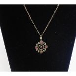 Early 20th century 9 carat gold garnet and seed pearl pendant on chain