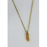 9 carat gold ingot pendant, on 9 carat gold belcher chain