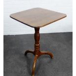 Mahogany tilt top table on a turned column on tripod legs, 73 x 54cm