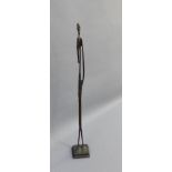 Bronze elongated figure on square plinth base, 49cm